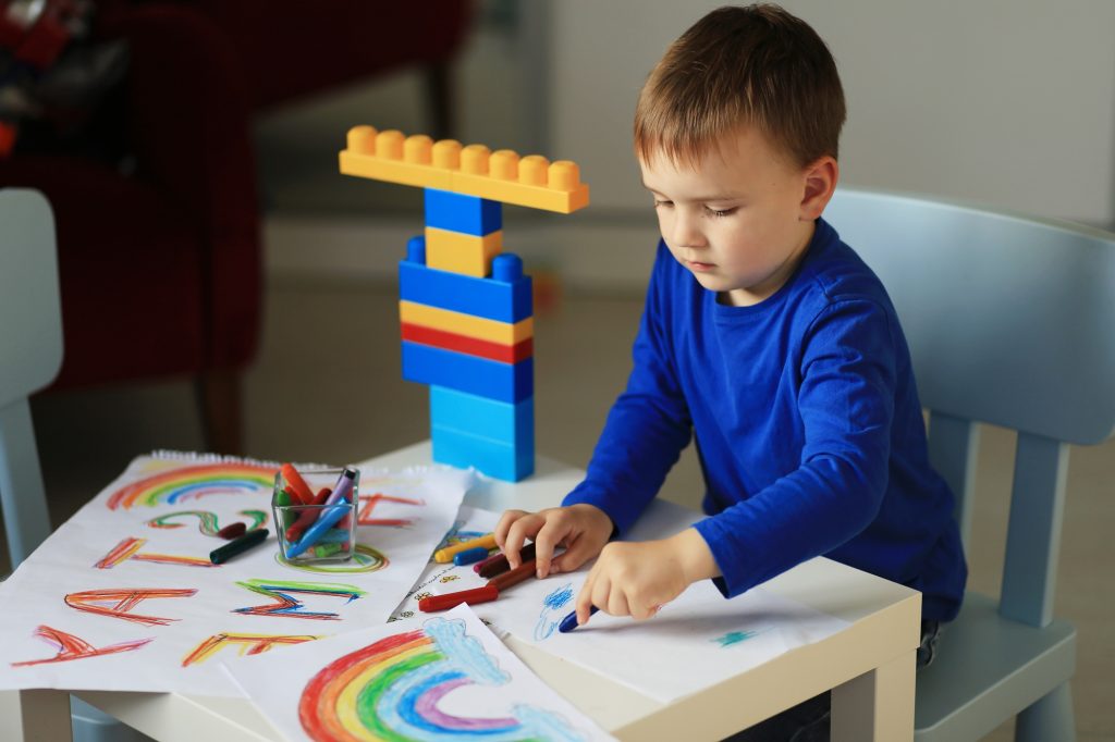 Kid drawing at home